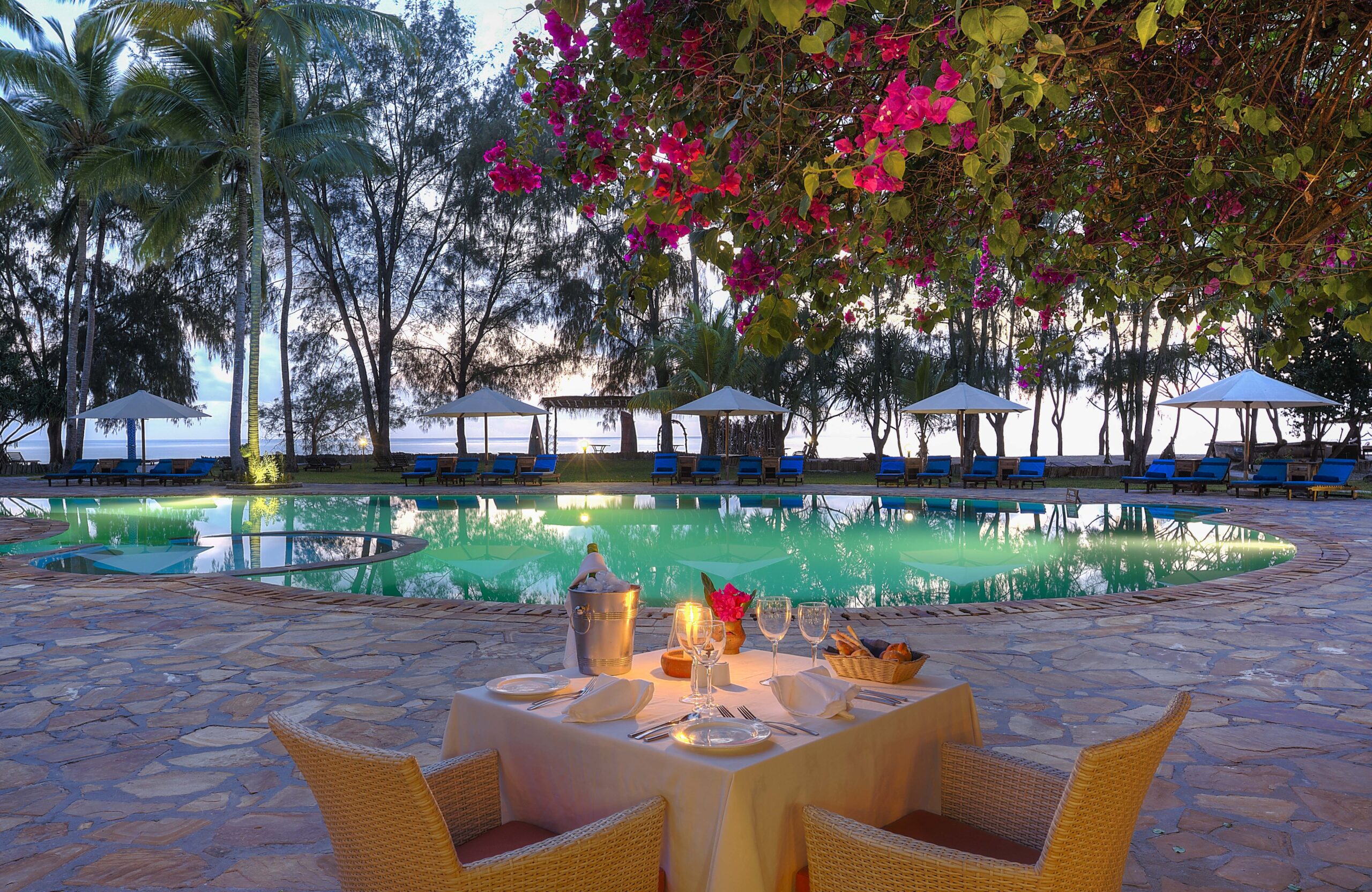 Dinner setting by the main pool